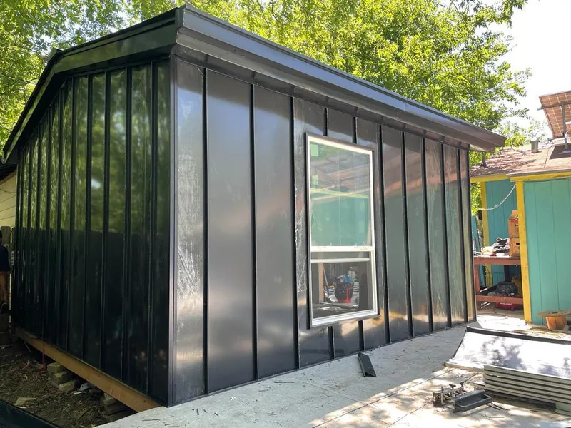 Black standing seam metal wall panels for Roof Inspection in Howard