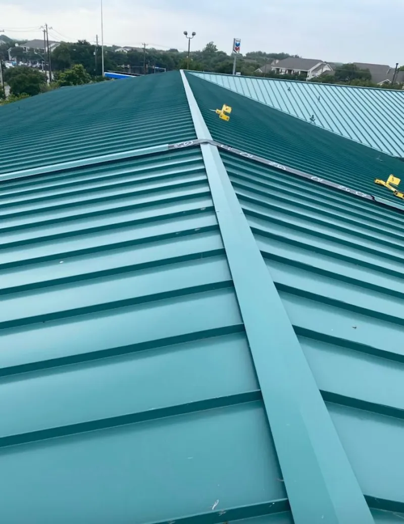 Green commercial metal roof ridge and valley for Metal Roof Repair in Howard