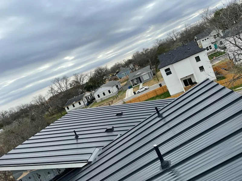 Standing seam metal roof panels with vents for Skylight Repair in Howard